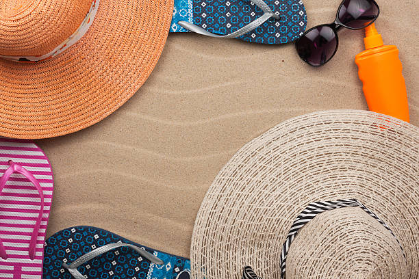istock Accessories for the beach lying on the sand 466819276