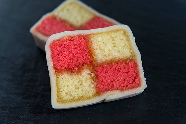 istock Two slices of battenberg cake 466819322