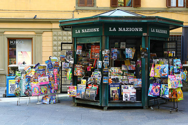 Old-fashioned newsstand in Siena, Italy Siena, Italy - March 14, 2015: an old-fashionned newsstand. No people. news stand stock pictures, royalty-free photos & images