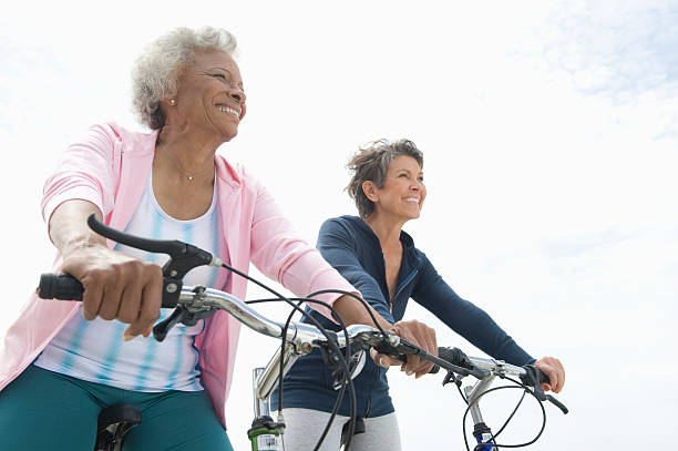 istock Senior Female Friends Riding Bicycle 466825479