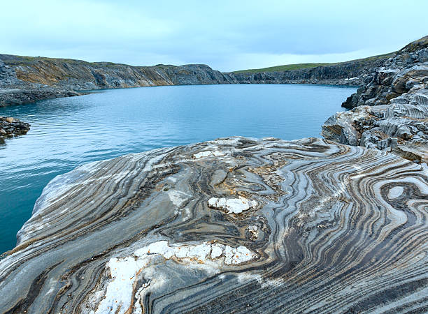 istock Striped stone near reservoir Storglomvatnet (Norge) 466825571