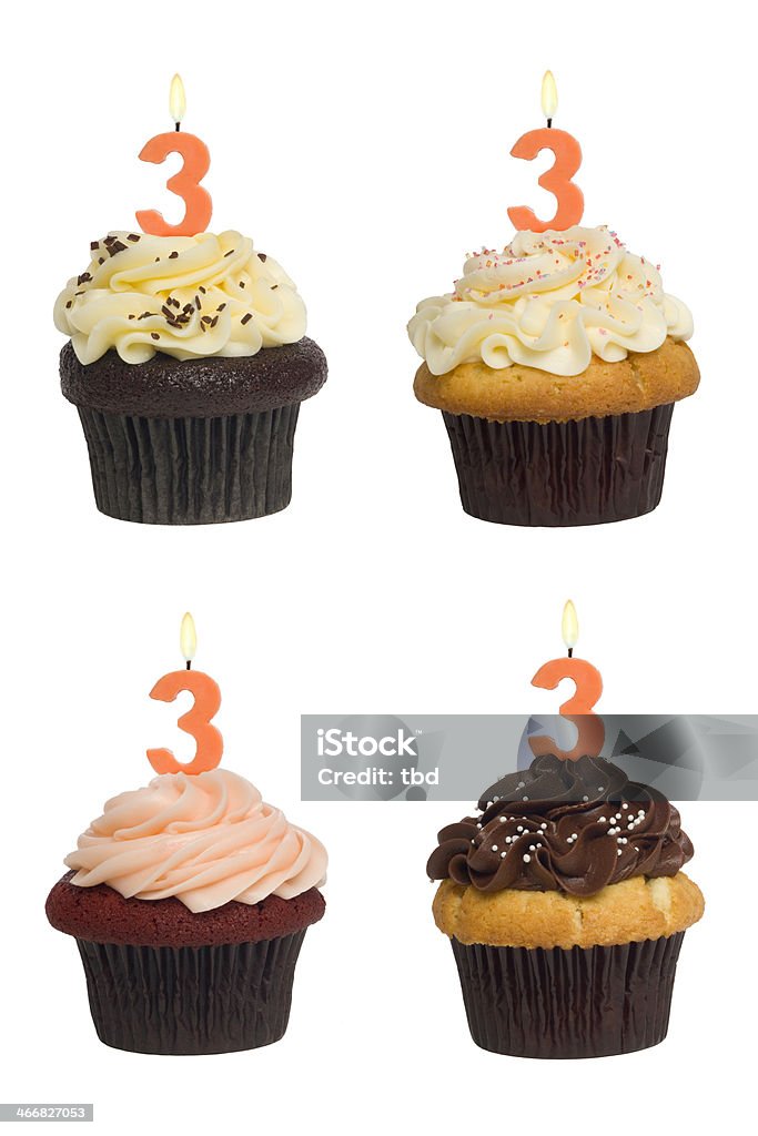 Numbered Cupcake Four different cupcakes: vanilla-chocolate, vanilla-vanilla, red-velvet and chocolate-vanilla. Each has a lit number 3 candle (see the "more cupcakes" link below to see  the rest of this series, featuring all single digit numbers). Shot against a pure white background. Birthday Stock Photo