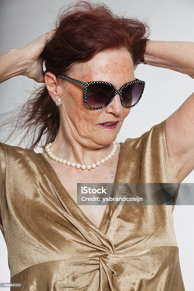 Retrato de mulher sênior com óculos mostrando as emoções. - Foto de stock de Adulto royalty-free