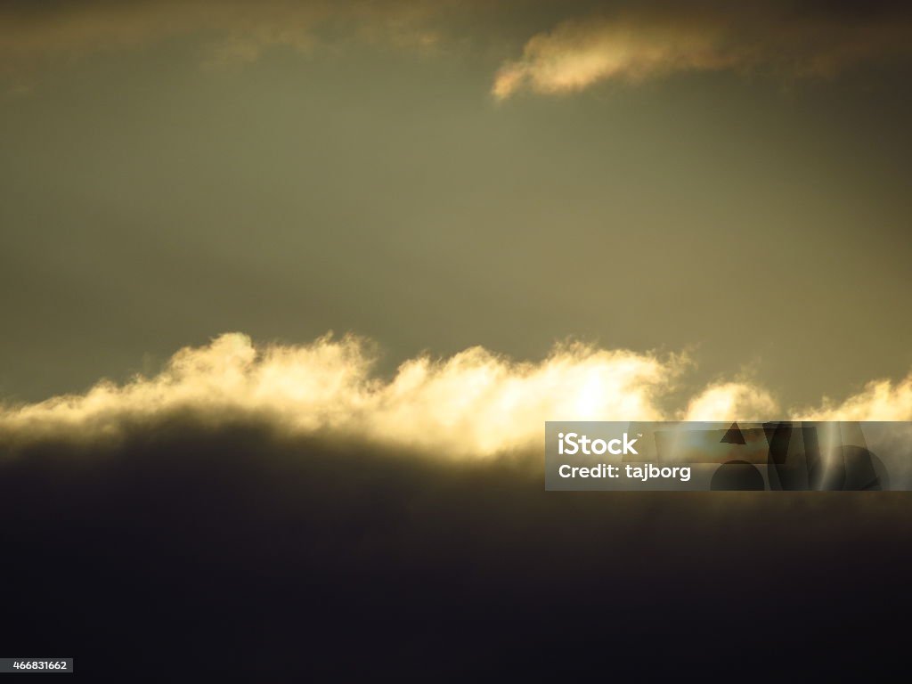Sunlight through the dark clouds beautiful images photographed from a distance. Great approach enabled these beautiful pictures suitable for a background as images. 2015 Stock Photo