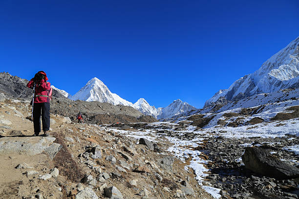 istock trekker kala patthar and pumo ri summit from everest trek 466832359
