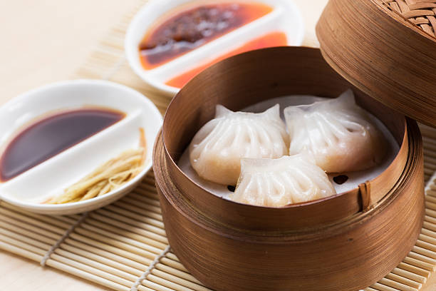 istock Steam Prawn Dumplings ( Dim Sum Ha-Gao ) In Bamboo Basket 466832457