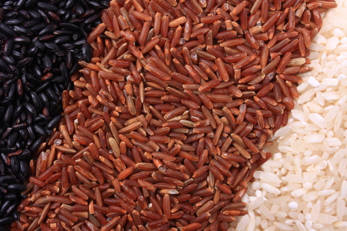 Three variety of rice: black rice, red rice, and white rice.