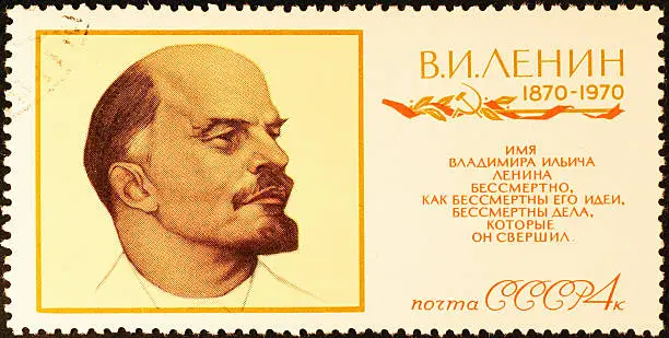 Photo of Head of Lenin on old russian postage stamp