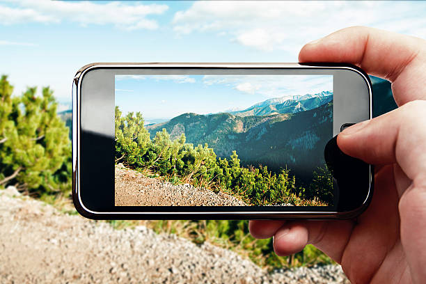 istock Smart phone mobile photo on mountain landscape 466834658