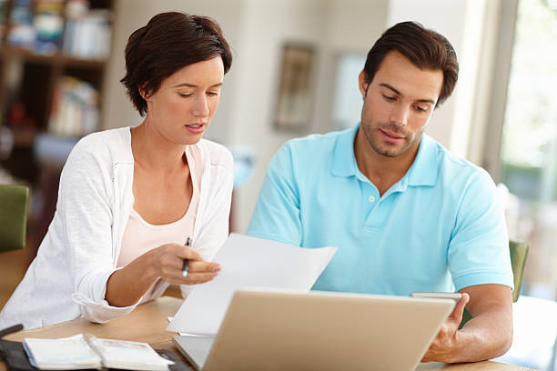 istock Reviewing their home finances 466835374