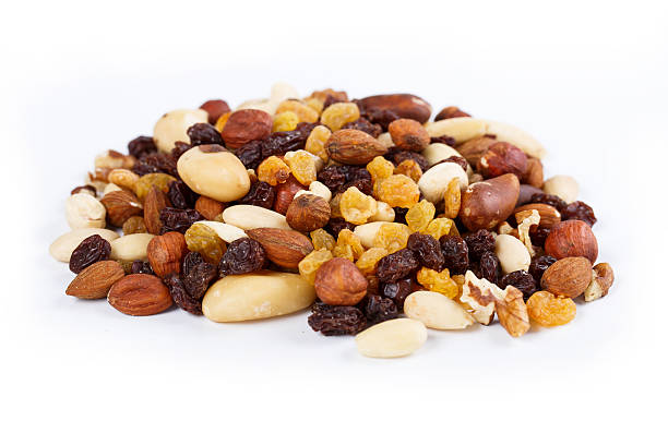 istock Mix of nuts close up on white 466835632