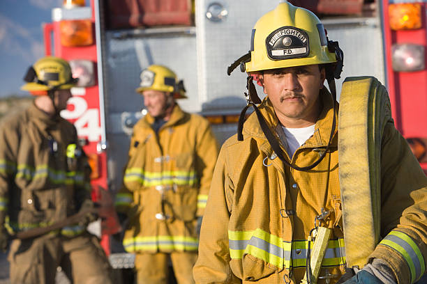fire fighters - brandweer stockfoto's en -beelden