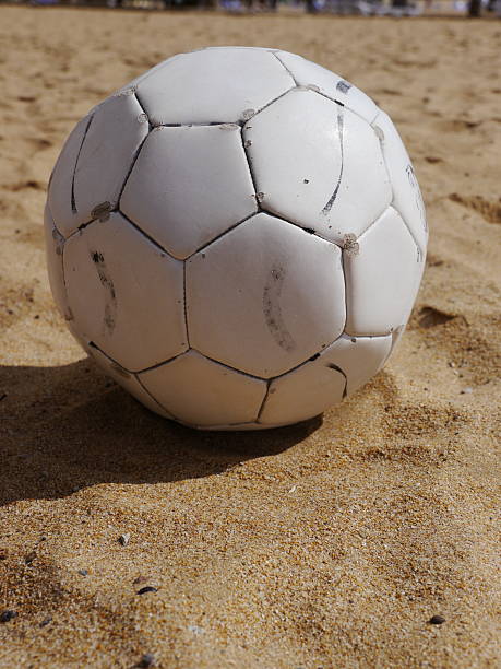 футбол пляжный мяч - sandy brown day the americas north america стоковые фото и изображения