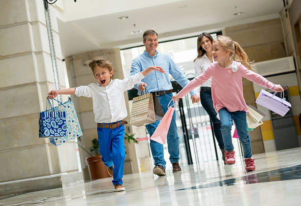 istock Family running at the shopping center 466837708
