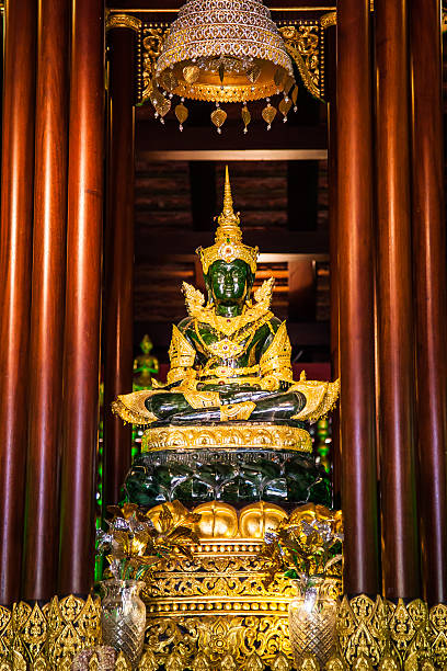 Chiang Rai, Thailand - May 2, 2013: Statue of Emerald Buddha in the temple named Wat Phra Kaeo.