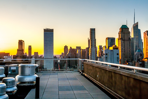 The rooftops of Midtown Manhattan as the sun goes down. 