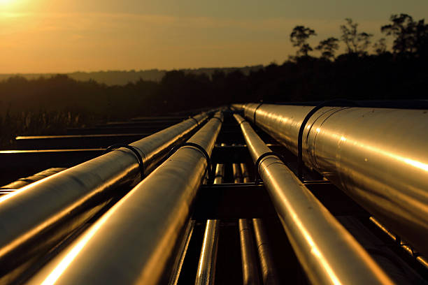pipeline connection  from crude oil field stock photo