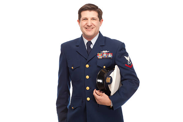 istock Smiling Coast Guard serviceman against white background 466844390