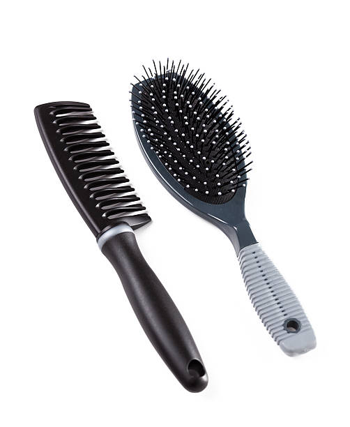 istock Black hairbrush and comb 466844469