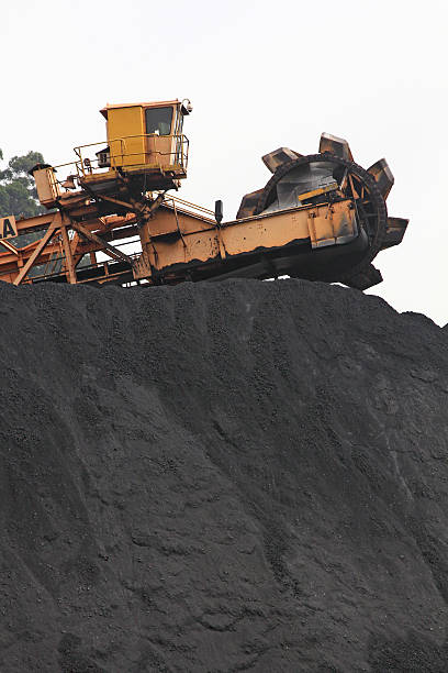 istock huge excavator of coal in a mine 466844565
