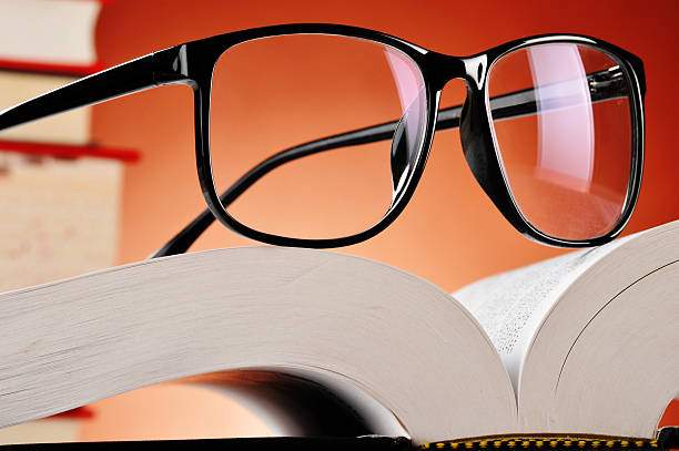 istock Composition with glasses and books on the table 466845243