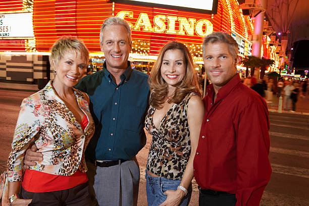 istock Happy Couple Standing Outside Casino 466847728