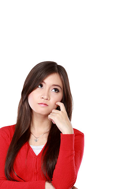 istock girl looking up to blank space. 466848228
