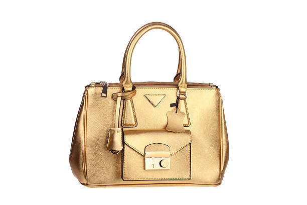 istock Golden handbag on white background 466848690