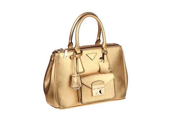 istock Golden handbag on white background 466848694