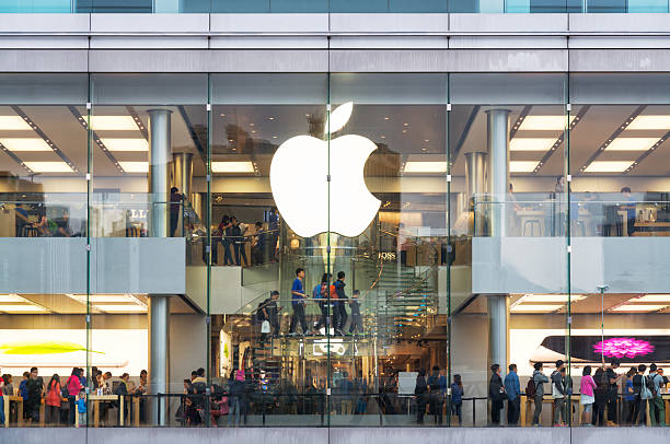 Apple Store in Hong Kong Hong Kong, Hong Kong SAR -November 08, 2014:A busy Apple Store in Hong Kong located inside IFC shopping mall, Hong Kong.  apple computer stock pictures, royalty-free photos & images