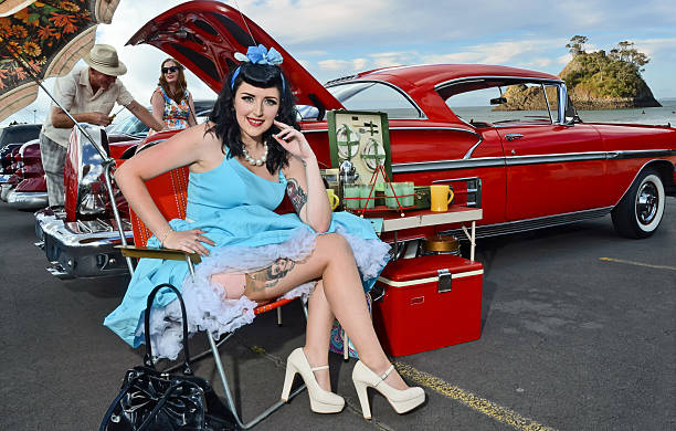 Vintage Style Girl Retro style young lady and classic car pin up girls and cars stock pictures, royalty-free photos & images