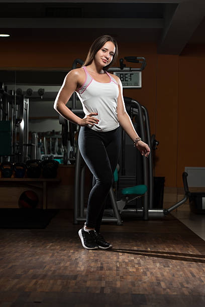 istock Young Cute Woman After Workout In Gym 466856538