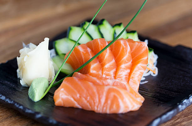 Salmon sashimi Close-up shot of fresh salmon sashimi, traditional japanese meal Sashimi stock pictures, royalty-free photos & images