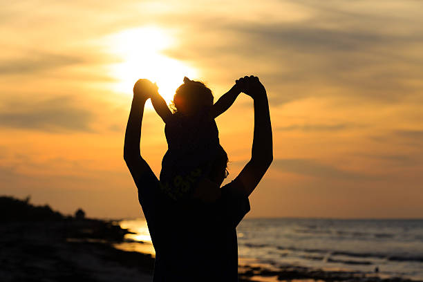 istock father and daughter having fun on sunset 466857240