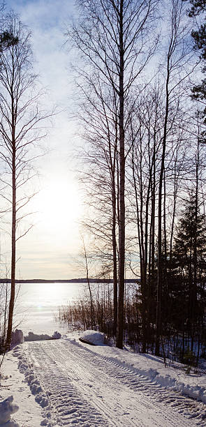 istock Winter landscape with lake and boat 466857648