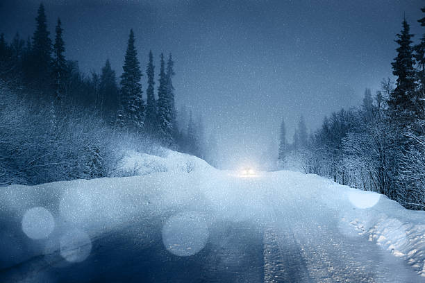 istock Defocused car lights in the winter 466859324