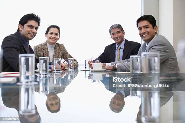 Business People At Conference Table Stock Photo - Download Image Now - India, Business Meeting, Teamwork