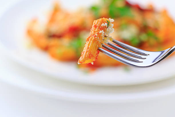 Penne arrabbiata - foto de acervo