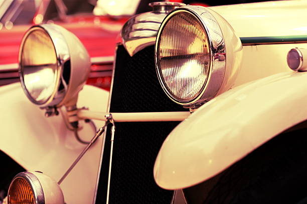 istock old retro car with big headlights 466864084