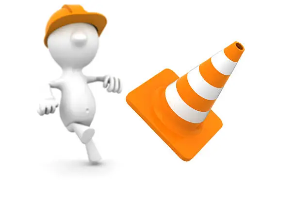 Workman kicking a traffic cone