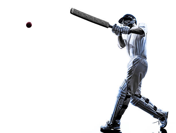 Cricket player  batsman silhouette Cricket player batsman in silhouette shadow on white background batting sports activity photos stock pictures, royalty-free photos & images