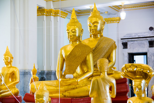 Golden Buddha statue at thai temple church,Sothon Temple,Chachengsao in Thailand