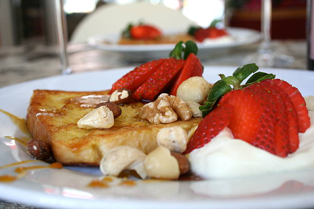 istock French Toast with Strawberries, nuts and cream 466875253
