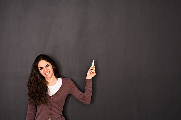 istock Woman Front of Blackboard 466877714