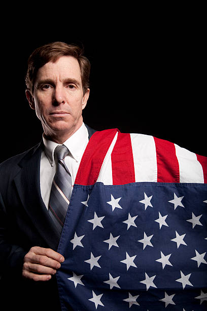istock Businessman holding the American Flag 466883015