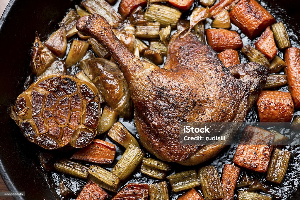 Braised Chicken Braised Chicken in a cast iron skillet. Baked Stock Photo