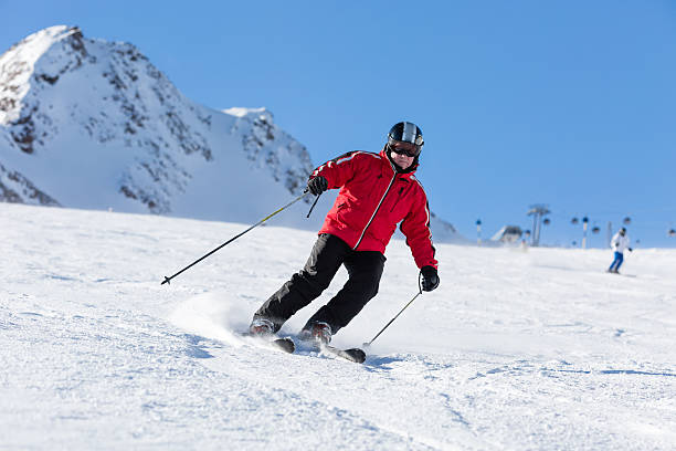istock Skier skiing on ski slope 466889534