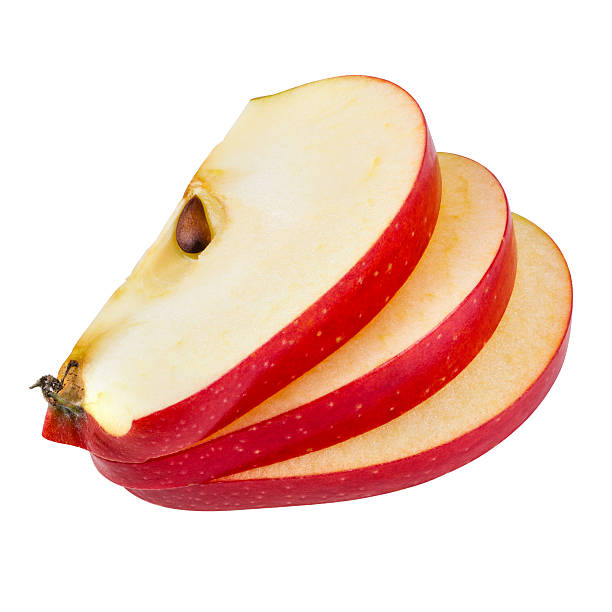 apple scheiben, isoliert auf weiss.  mit clipping path - red delicious apple red gourmet apple stock-fotos und bilder