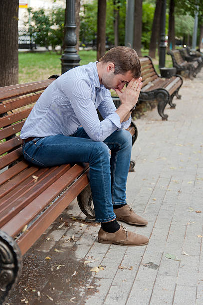 istock Man sits in the public garden 466911723