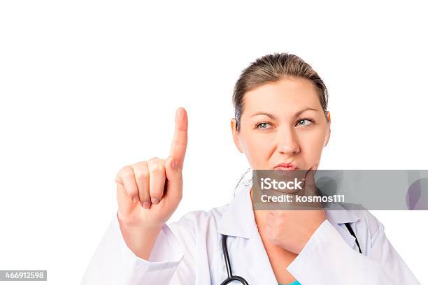 Pensive Doctor And Free Space For Your Inscription Stock Photo - Download Image Now - 2015, Adult, Adults Only